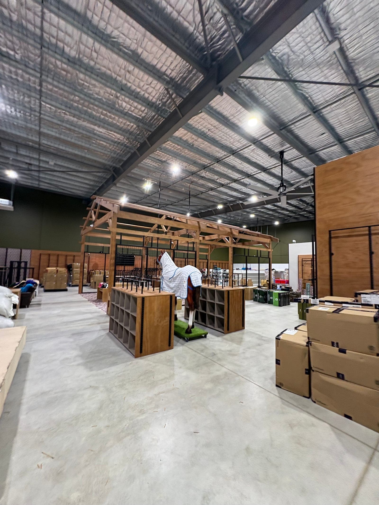 Commercial warehouse downlight installation during fitout